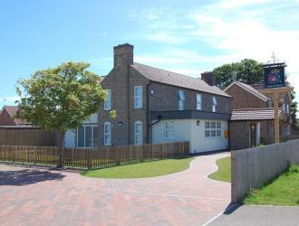 view of Hub from car park entrance